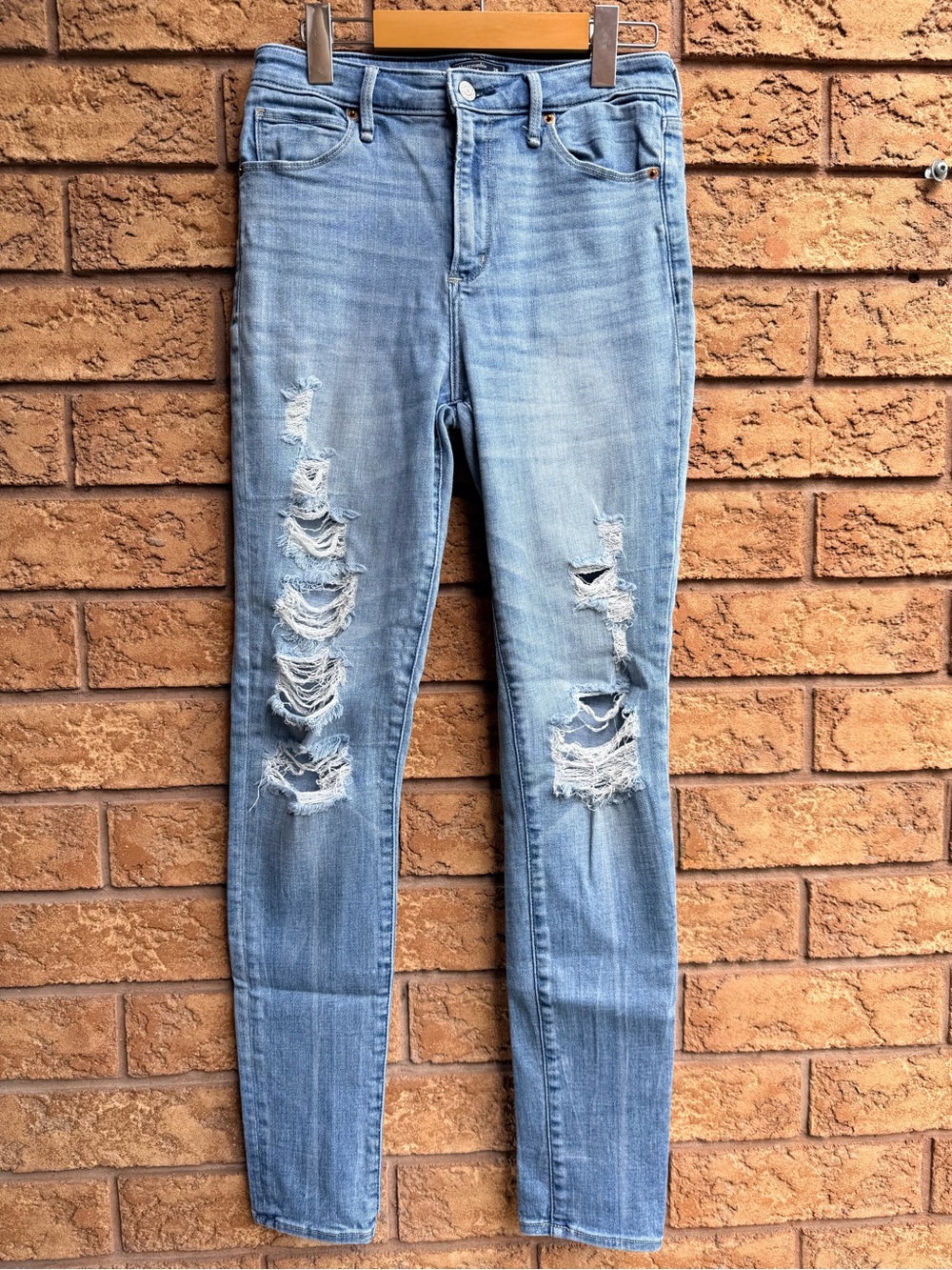 • Abercrombie & Fitch Simone High Rise Super Skinny Light Wash Distressed Jeans